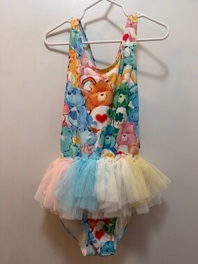 Rock Your Kid One-Piece Carebear Swimsuit in Rainbow Pastels with Tutu
